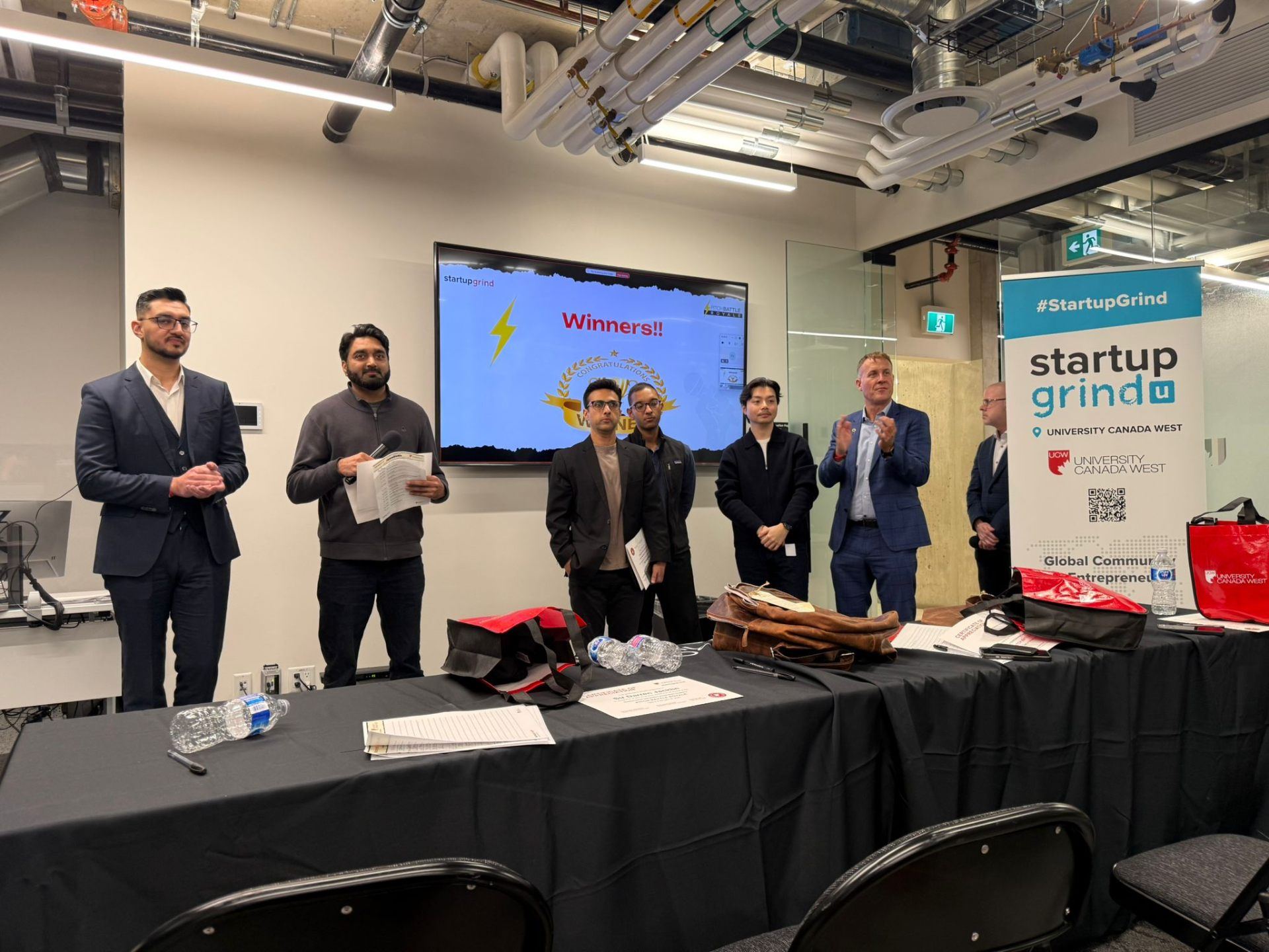 Students presenting at the Innovation-to-Market industry showcase