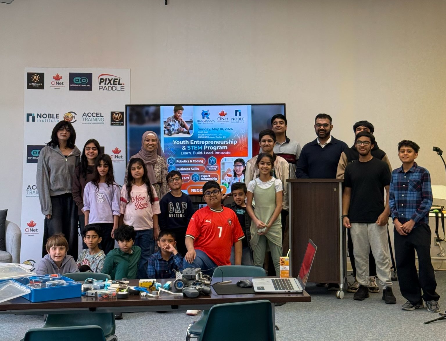 Youth Entrepreneurship & STEM Program group photo with students and mentors
