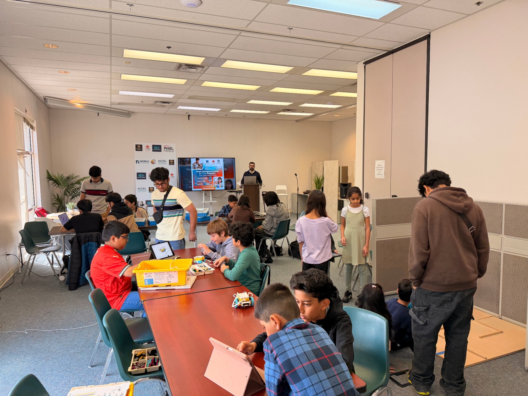 Wide view of a full Youth Innovation Lab session